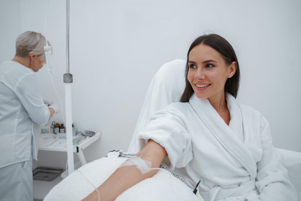 Energy IV therapy nurse in London administering wellness drip